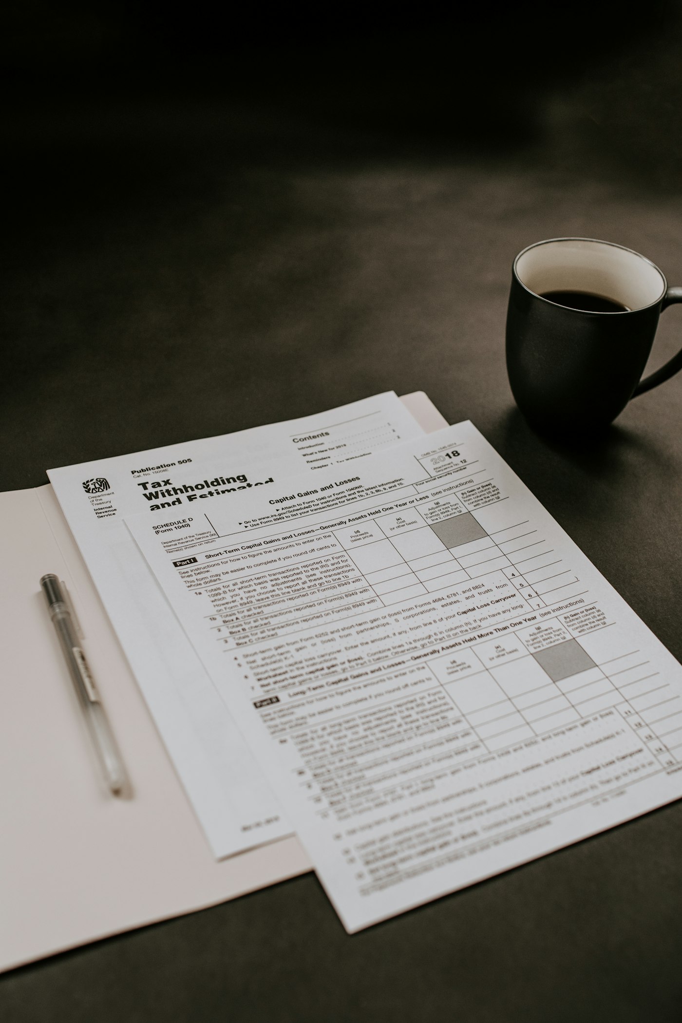 Investment analysts reviewing reports